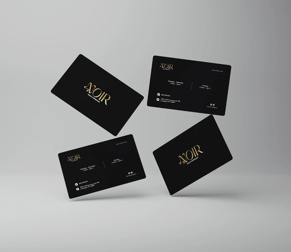 Noir Nails black salon cards with logo and location details